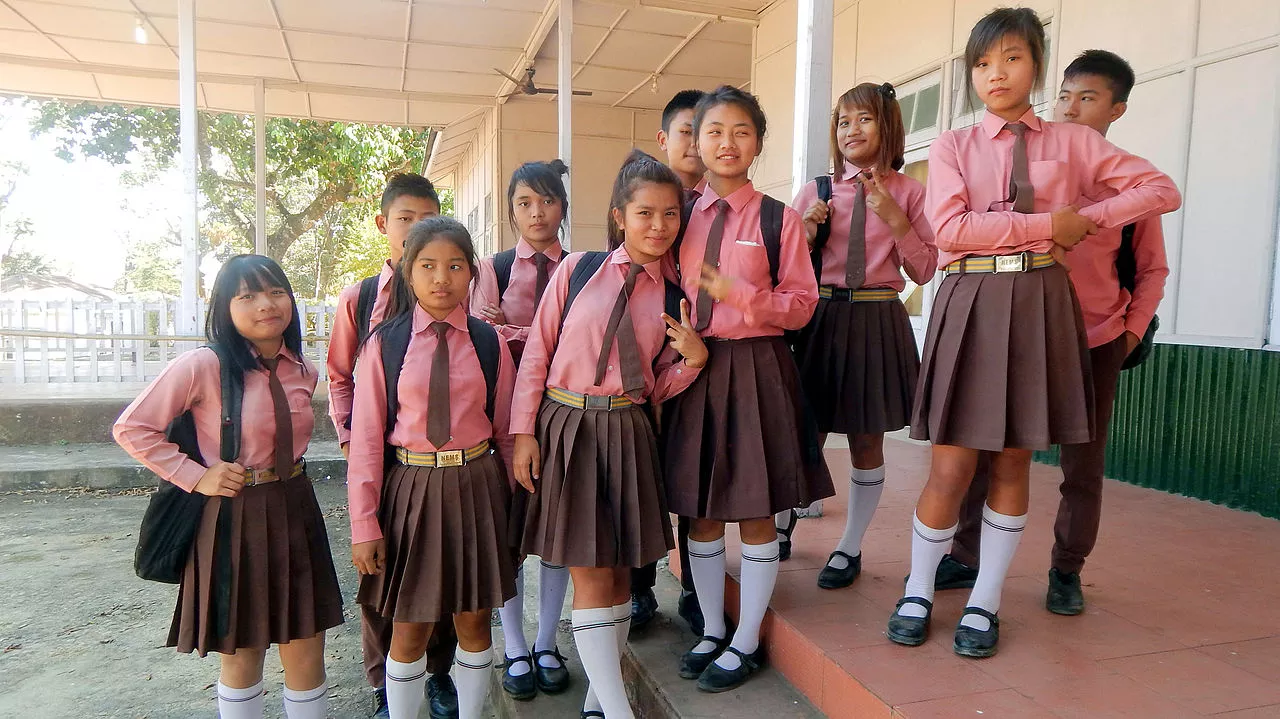 Group of school children in uniform.